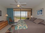 The master bedroom has bay views and a king sized bed 